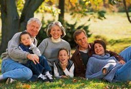 A Happy Family of Grandparents, Parents and Grand Kids