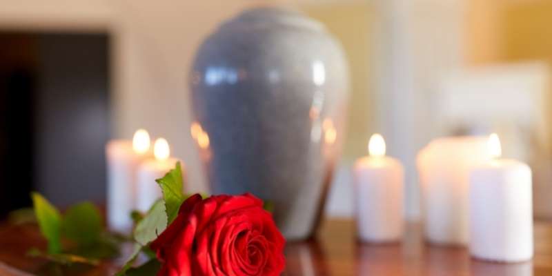 Cremation Urn with Candles and Rose