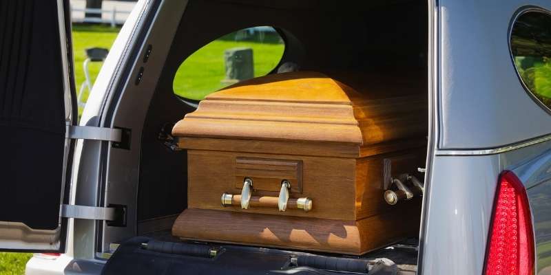 A hearse with a casket inside